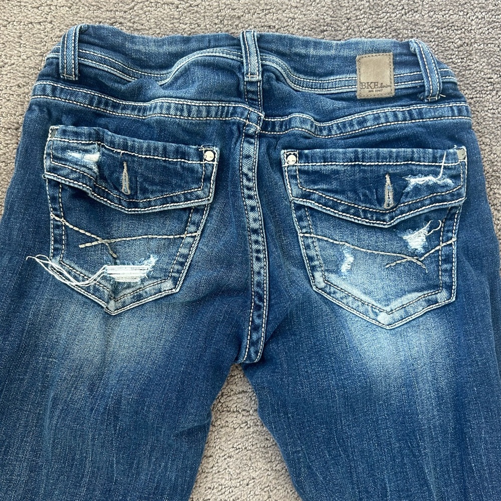 BKE Stella Stretchy Low Rise Blue Ankle Cropped Capri Jeans with Distressed Hem - Picture 7 of 10